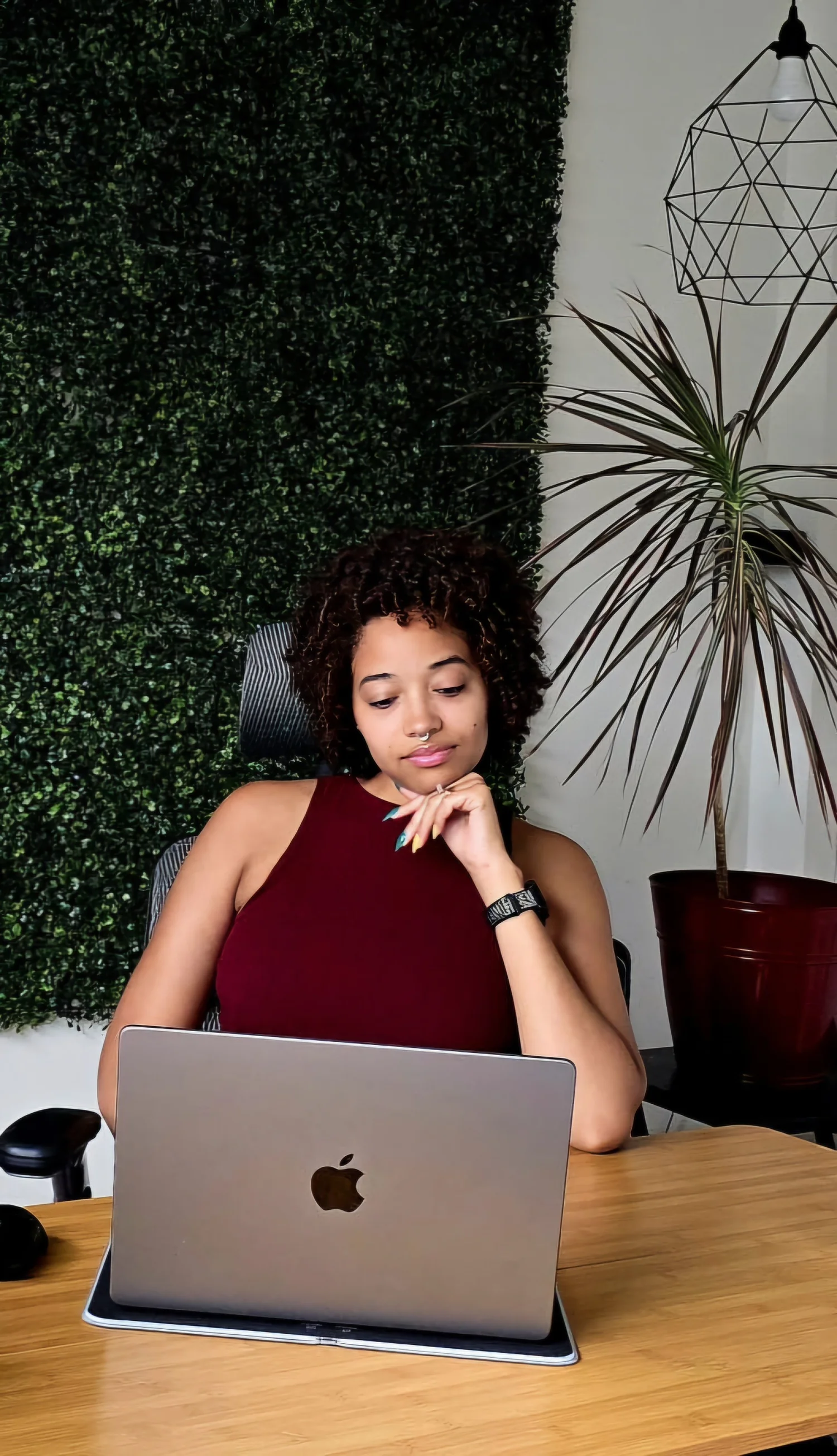Anicka Winfield working at her laptop
